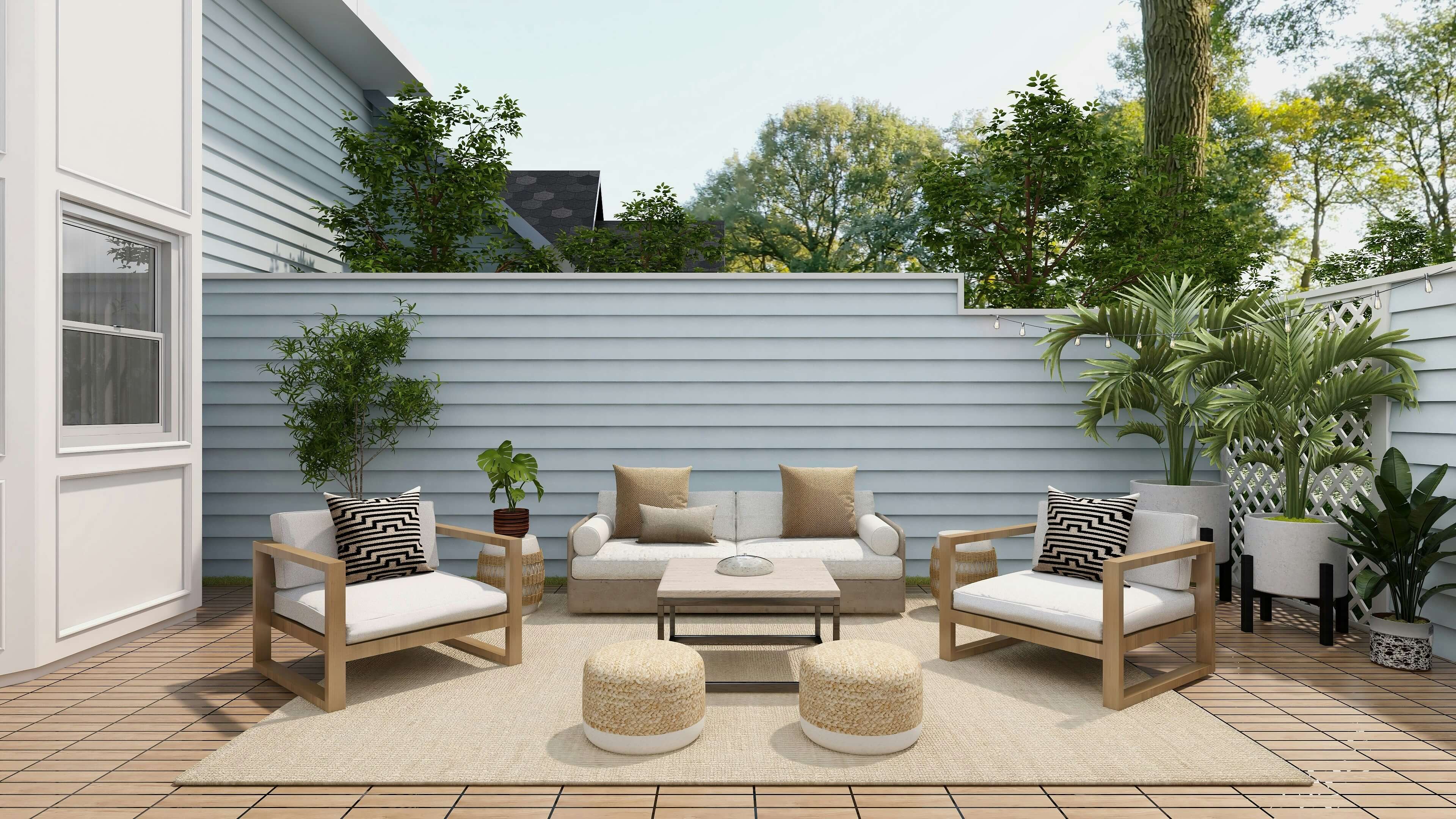 Well-kept garden with flowers, planters, and a relaxing outdoor seating area